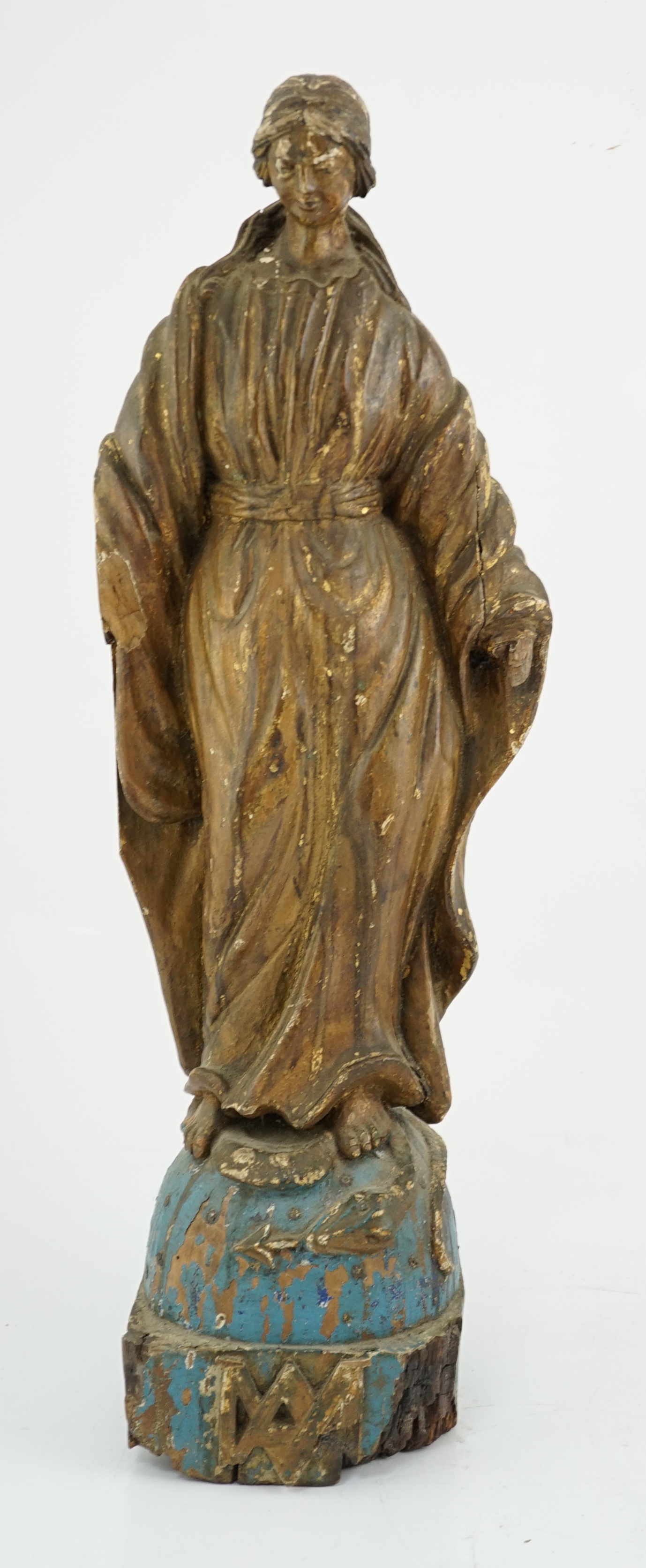 An 18th century Continental carved wood figure of a female saint